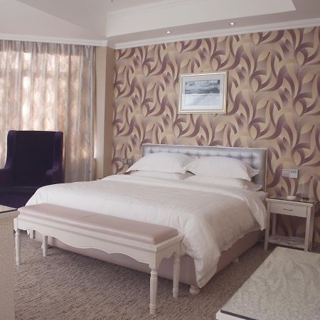 Xinyijia City Hotel Urumqi Bagian luar foto